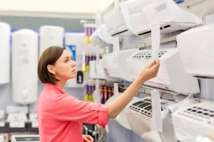 woman buys a air conditioner