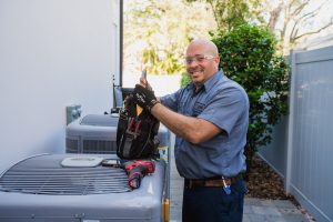 Cox technician with tools